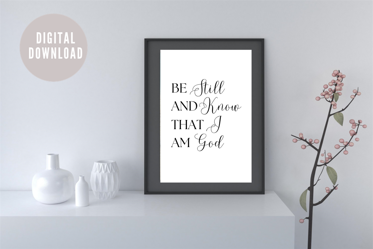 Black and white typography Bible verse artwork displayed in a narrow hallway above a console table, styled with decorative vases and a hall plant
