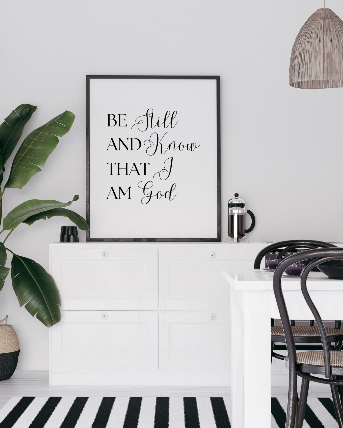 Framed artwork with Bible motivational quote in a modern interior setting