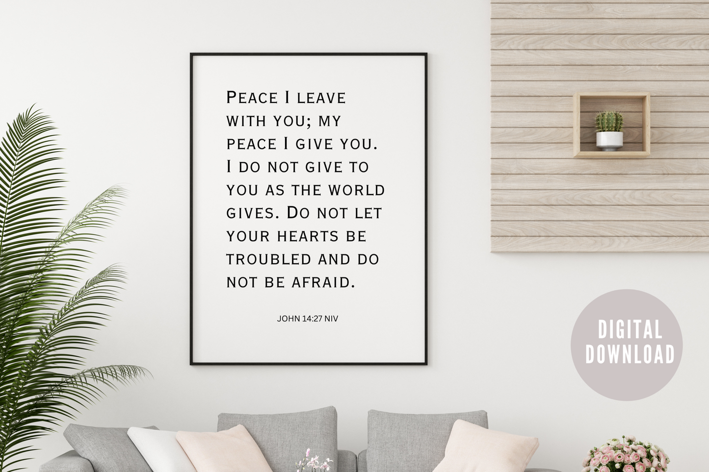 Motivational scripture wall decor displayed above a cosy sofa in a trendy living room with earthy textures and modern furnishings.