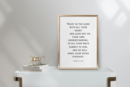 Printable Proverbs 3:5 Bible verse wall art in modern typography framed in a clean, minimalist living room.