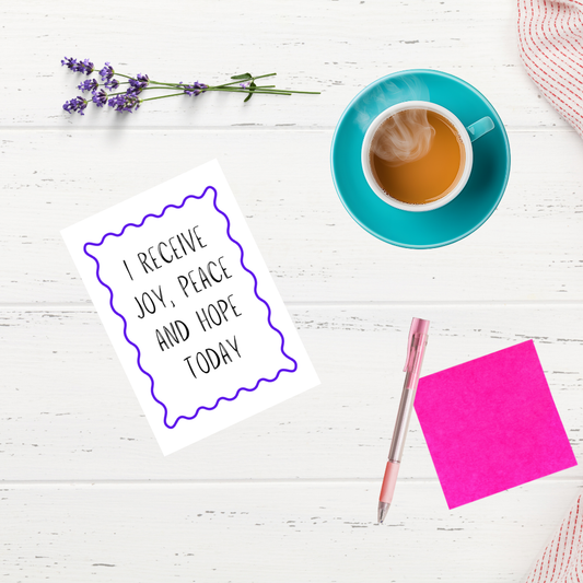 Inspirational typography poster with positive quotes for life displayed in a feminine home office setting