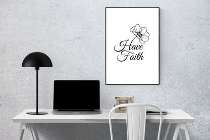 Black and white Have Faith wall art styled in a modern home office with simple, minimalist décor