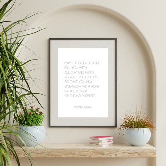 Inspirational scripture typography print used as statement wall art in a simplistic living space