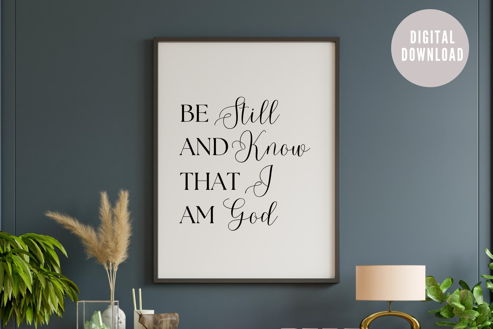 Framed artwork with motivational quote on a dark wall, digital download label visible