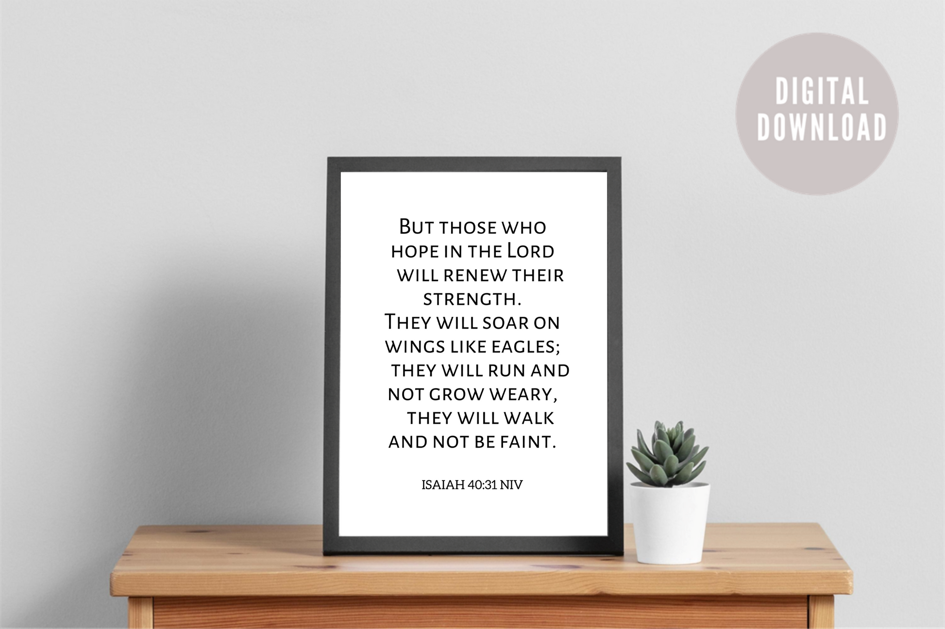 Isaiah 40:31 NIV printable wall art Christian bible verse typography displayed on a wooden table with a potted plant. This is a digital download print.