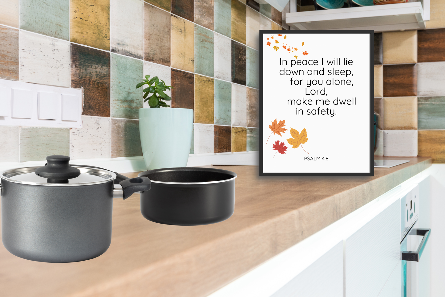 Modern typography Bible verse print displayed in a bright kitchen corner with rustic tiles.