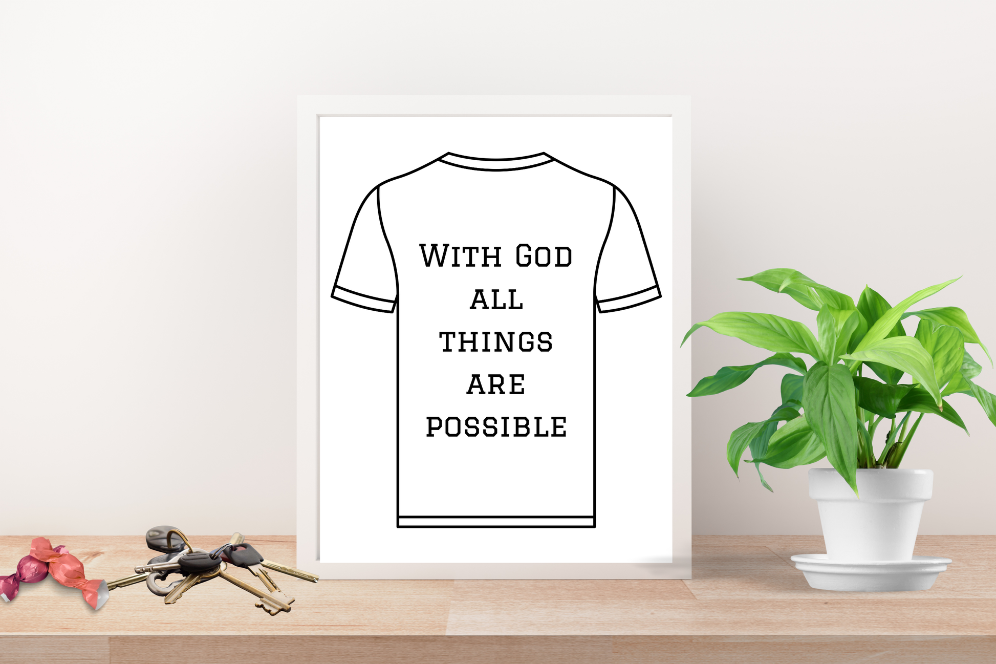 Christian typography wall art print reading “With God, All Things Are Possible” framed in a hallway with soft natural light.