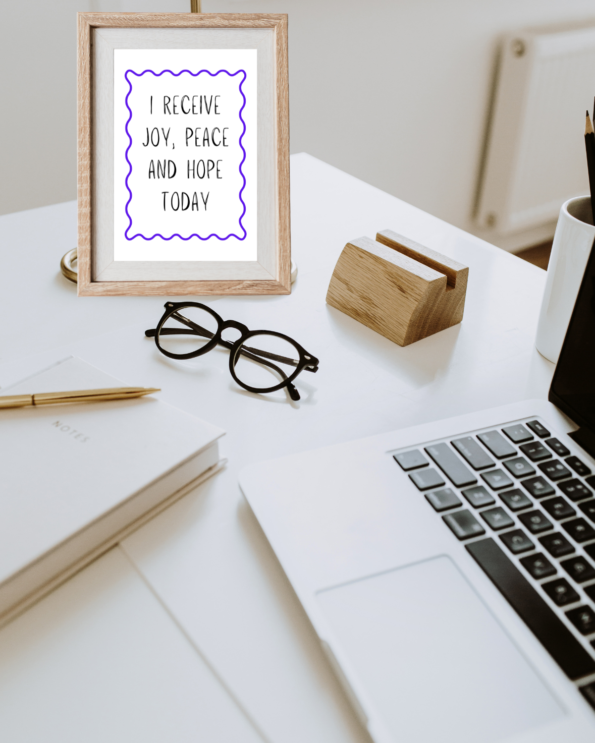 Motivational printable wall art with bible verse inspired typography framed in a modern home office.