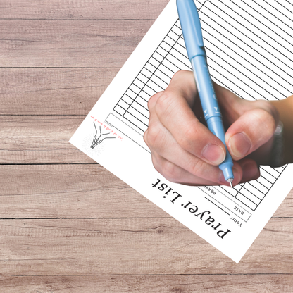Printable prayer request planner sheet  on a table