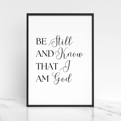Framed print with 'Be Still And Know That I Am God' text on a white background