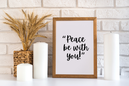 High-definition scripture-inspired printable wall art of Peace Be With You framed sign on a white surface with candles and wheat plant.