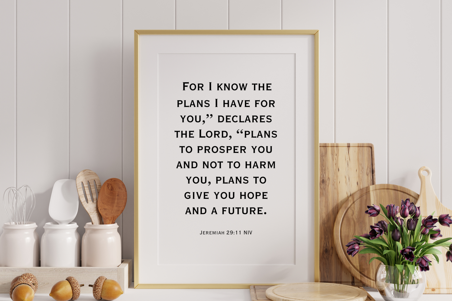 High-definition scripture wall art printable of Jeremiah 29:11 styled in a frame on kitchen counter with kitchen utensils.