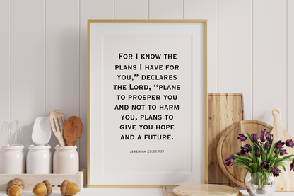 High-definition scripture wall art printable of Jeremiah 29:11 styled in a frame on kitchen counter with kitchen utensils.