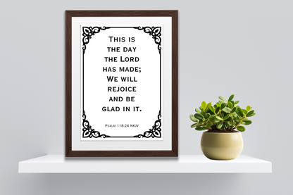 Inspirational scripture digital art print of Psalm 118:24 styled on a minimalist home shelf with clean decor and a plant.