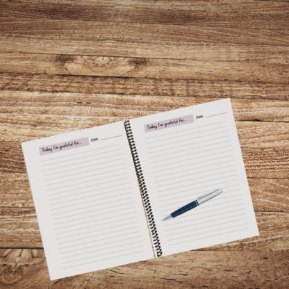 Video clip of RIP While Alive Daily Gratitude Journal on a cozy home desk with a pen — 150-page Christian gratitude notebook for daily reflection.